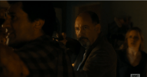 Daniel Salazar appears, takes the gun from Madison, and orders Travis to stand back.