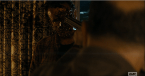 He marches toward the monster until the end of the shotgun is a mere inch or two from its face...