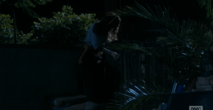 Chris rushes up, calling for Alicia, and grabs a hold of her, pulling her across. Alicia, terrified, continues to kick at the clawing dead woman, screaming, until she is finally free of those grabbing hands.