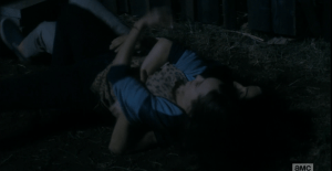 Chris and Alicia topple to the ground, Chris underneath Alicia. To his credit, he is trying to talk to her, tell her who he is, that he's trying to help her...