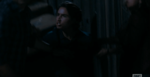 As Alicia gets up and rushes over to her mom, Chris jumps up, facing Alicia angrily. His nose is bleeding.