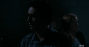 Travis looks at Nick.