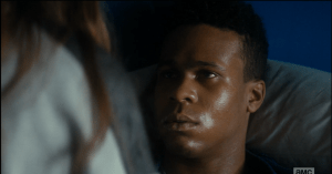 He looks back at Alicia.