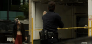 ...to no avail. of course. The officer raises her hand in the