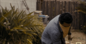 The next morning, Travis begins the thankless job of digging Peter Dawson's grave.