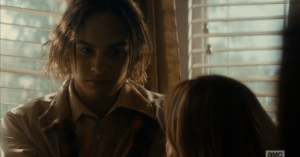 Nick looks at his mom.