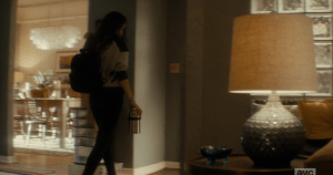 Nick sees Alicia grab her backpack and a thermos of soup and head towards the door.