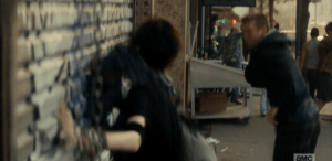 And not a moment too soon, for as soon as the barber pulls the metal door down and barricades his door, rioters launch themselves at the metal door, pushing and kicking at it as they run past.