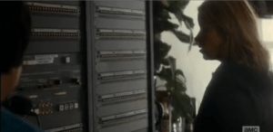 Madison and Tobias stand a moment, listening to the savage noise. 