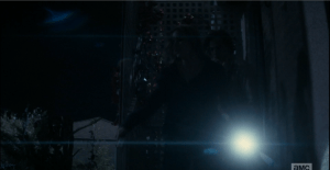 Leading the way, Madison shines the flashlight as she, Nick, and Alicia file out of the Chans' home and run towards the labyrinth, back towards their home.