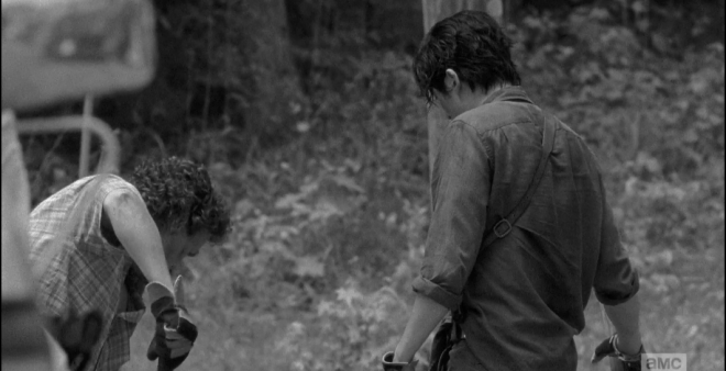 Time shifts back, to the barrier construction, as Glenn and NIcholas work, side by side.