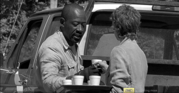 Back in time, back at the construction site, Carol offers Morgan a cup of water, which he accepts with a thanks.