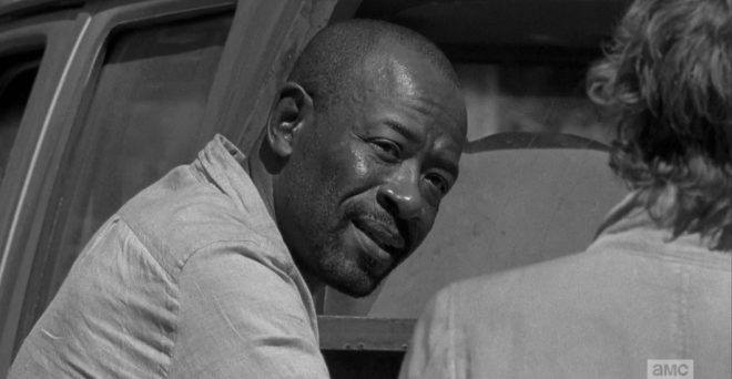 Morgan looks Carol over with a deferential nod, looks away,
