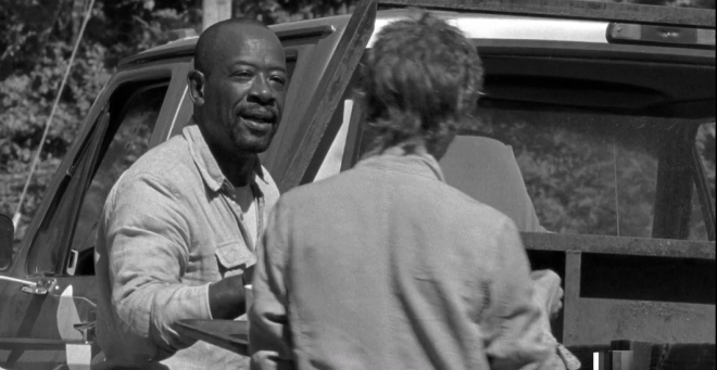 As she turns away, Morgan looks at her.