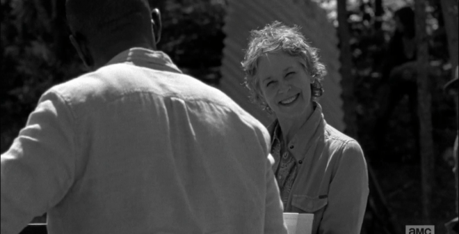 Carol turns back to Morgan, her forced smile even bigger.