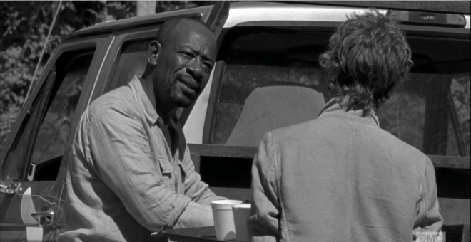 Morgan regards Carol.
