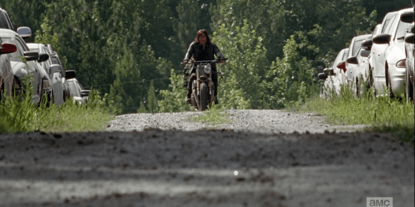 ...Daryl, who coasts slowly on his motorcycle, coming up over the hill. We do not see the massive horde of walkers just a few feet behind him, yet, but we hear their savage caucophony grow louder and louder as Daryl rolls closer. Always putting himself at the greatest risk for the good of all. How we love thee, Daryl Dixon! <3