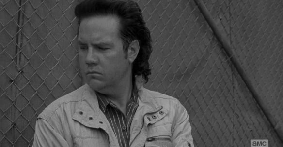 Meanwhile, manning the gate, Eugene hears the sound of a vehicle pulling up, then a voice on the other side of the fence, 