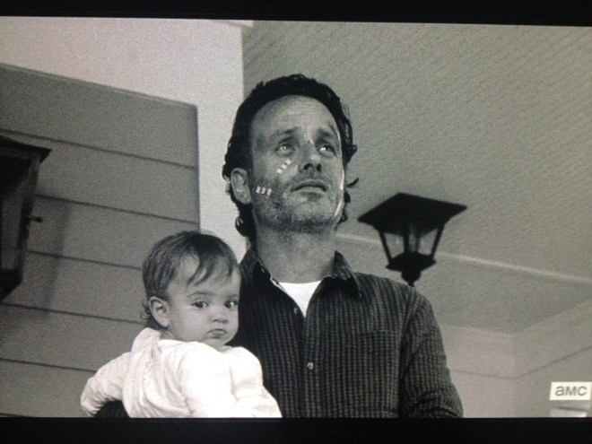 Rick comes out, carrying Judith, and he and Morgan remark about the lovely evening.
