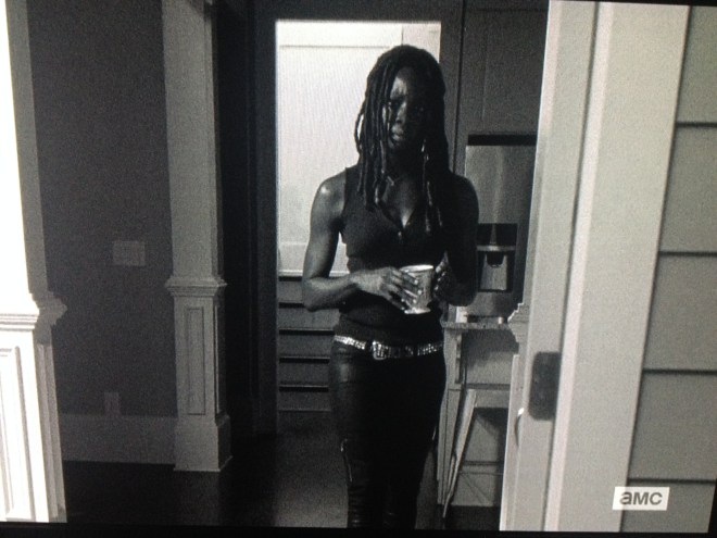 Michonne comes forward, overhears this conversation. Morgan asks Rick if they have room, and Rick tells him they'll make room. He gestures to Morgan's quarters across the street,