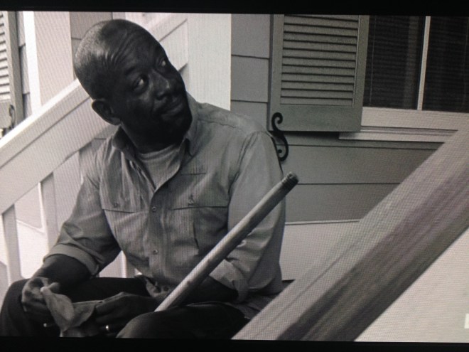 Morgan looks at Rick, pleased. He then looks at Judith, which Rick notices.