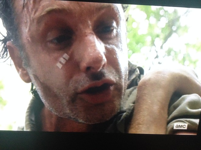 To his credit, Rick Grimes tries to calm him, but to no avail, of course.