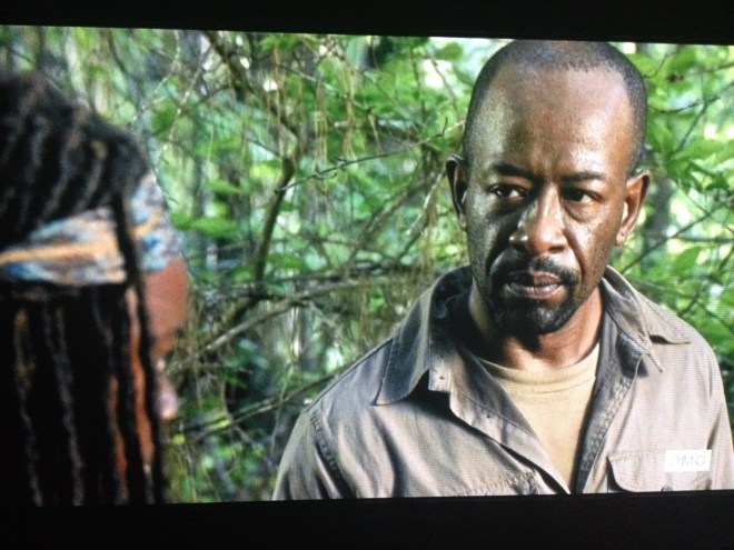 He looks over at Michonne.