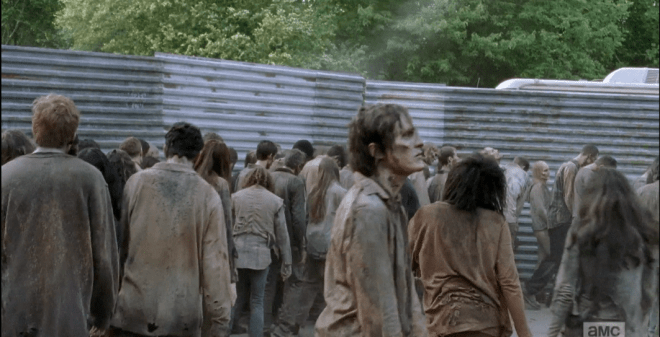 The flares begin to capture some walkers' attention...