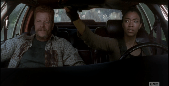 Abraham checks the rearview, notes with a satisfied smile that the walkers are back on track.