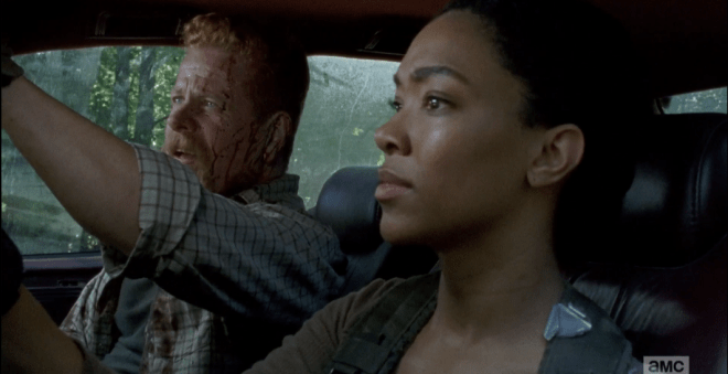 Abraham jumps back in the car, checks his appearance in the rearview mirror, chuckles.