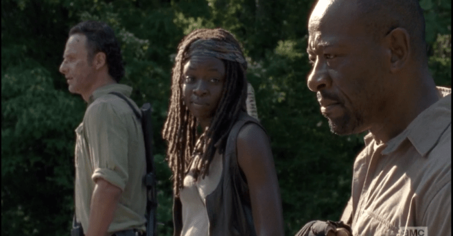 Michonne looks over at Morgan, her face softening with inner mirth, and she answers quietly, with a smile in her voice,