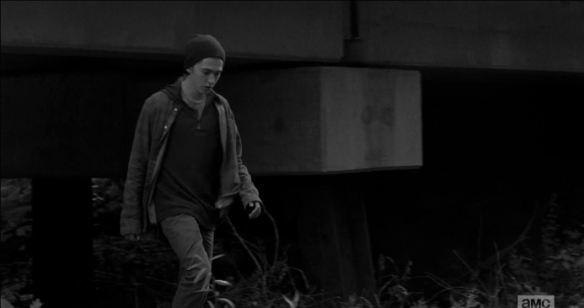 In the next shot, time shifts back, again, and we see Ron, coming out from under a bridge, alone.
