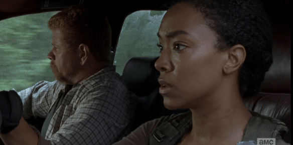 As the car speeds down the road, Abraham looks out the window, asks Sasha, casually, 