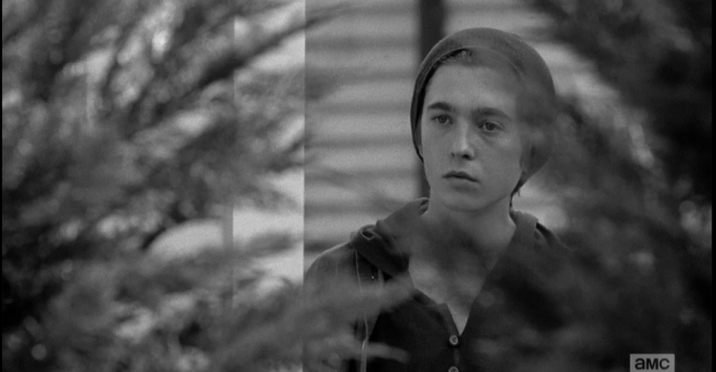 Poor young Ron looks on from behind the bushes as Deanna instructs,