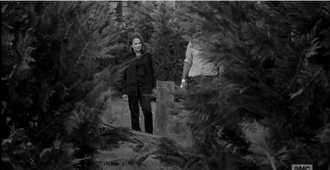 As Ron looks on, Deanna continues, telling the men to take Pete's body