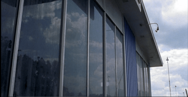 Time shifts again, and the tractor store walkers are banging against the glass in a fury to get out and chomp Glenn, Heath, and Nicholas, who stand outside in the parking lot.